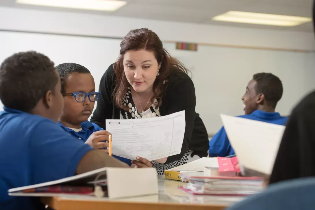 Student teacher working with students