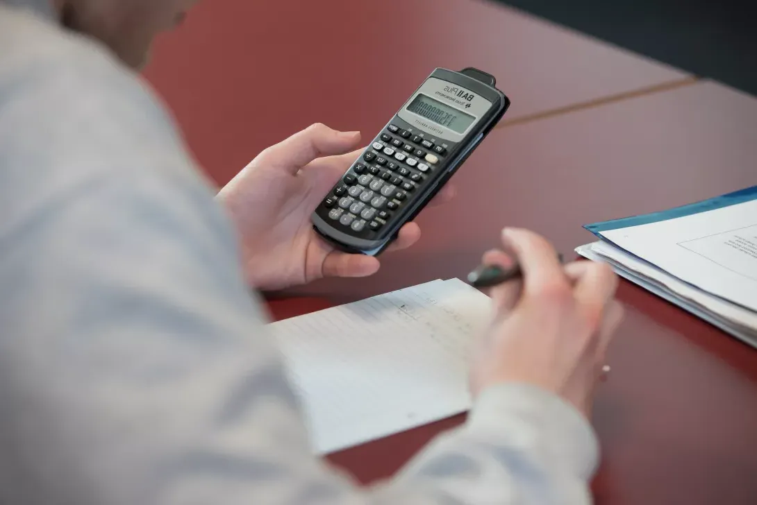 Student using a calculator