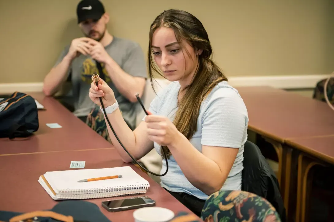 5G wireless training student studies equipment in classroom