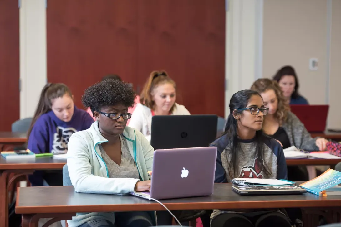 Students in classroom, on computers