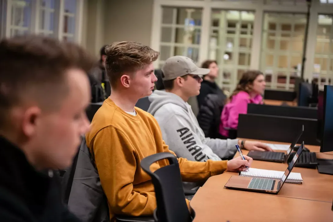 Students taking notes